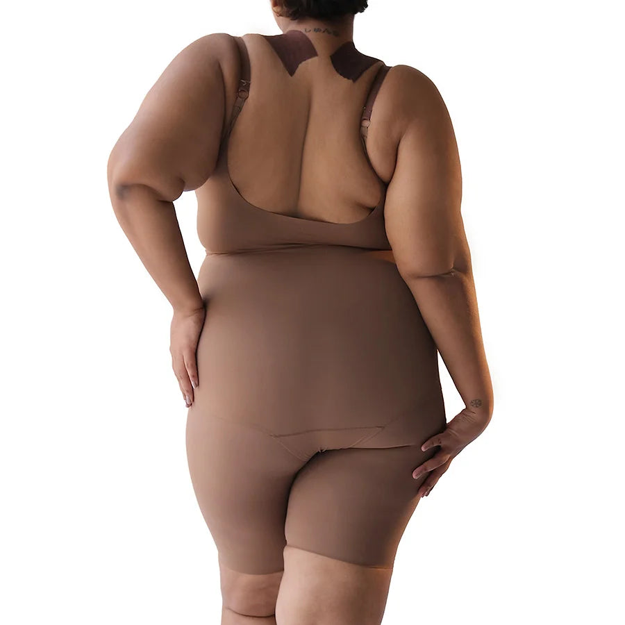 Brown full bodysuit model showcasing smooth, seamless fit from back.