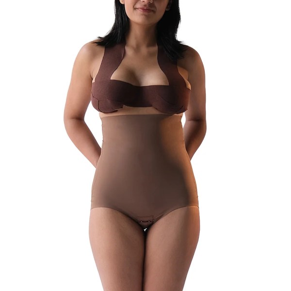 "Model showcasing Super Edge shapewear for a flattering silhouette."