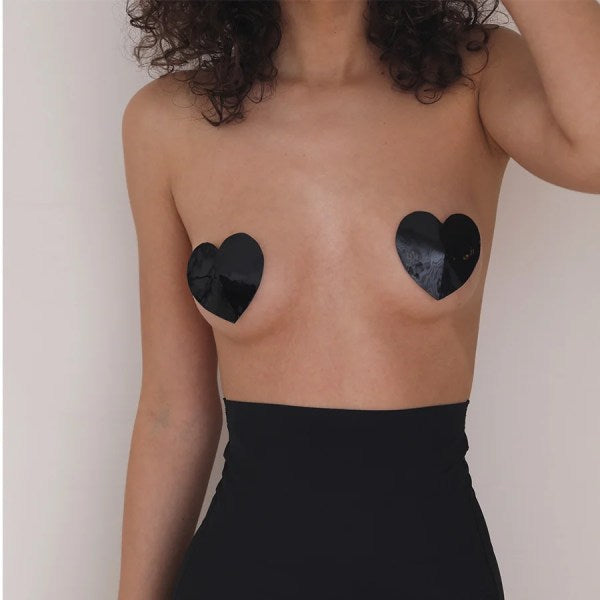 Black heart pasties for stylish coverage and playful outfits.