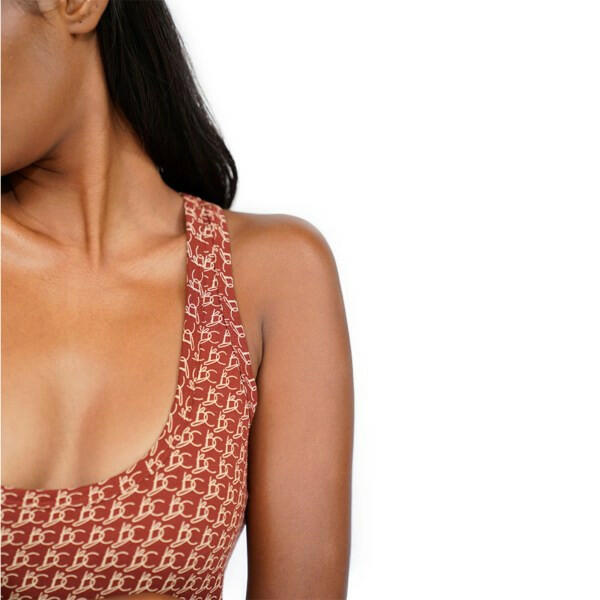 Long Scoop Tank top in stylish brown print worn by model.