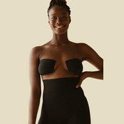 Model showcasing body tape for seamless support and style.