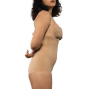 Nude bodysuit worn by a model showcasing stylish design.