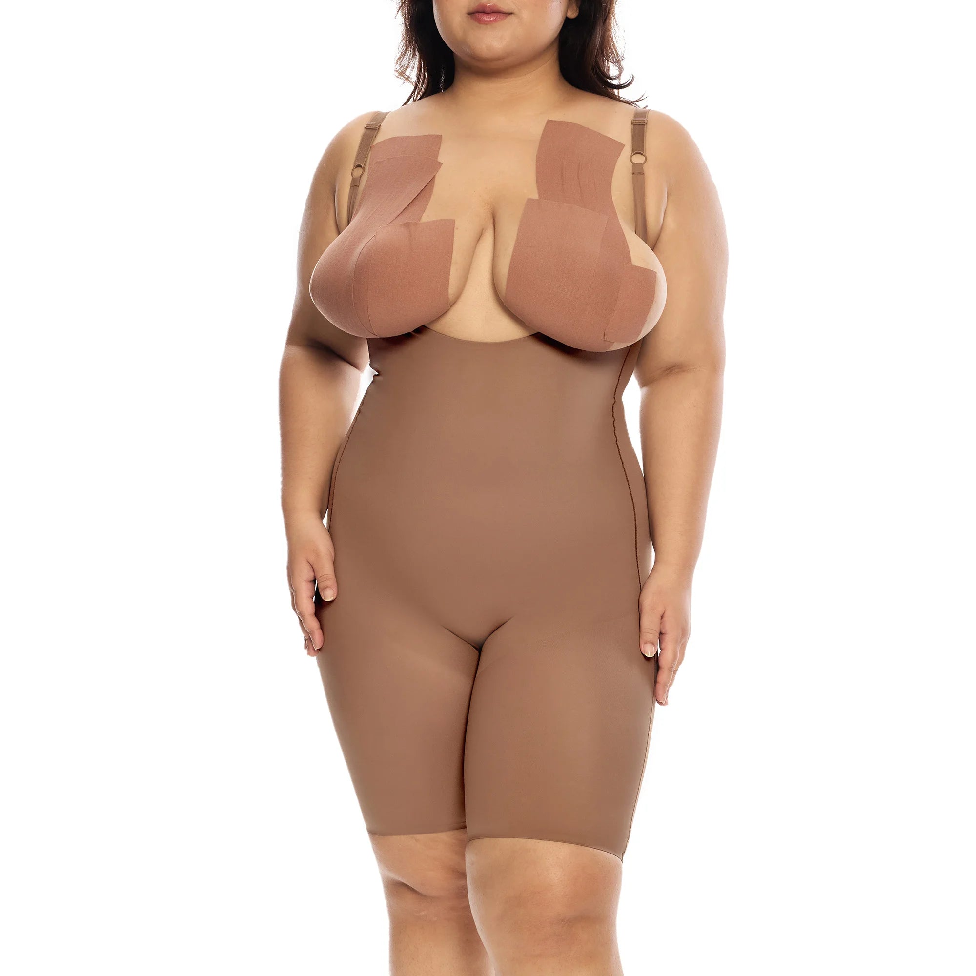 Mid-thigh bodysuit on model, ideal for shaping and comfort.