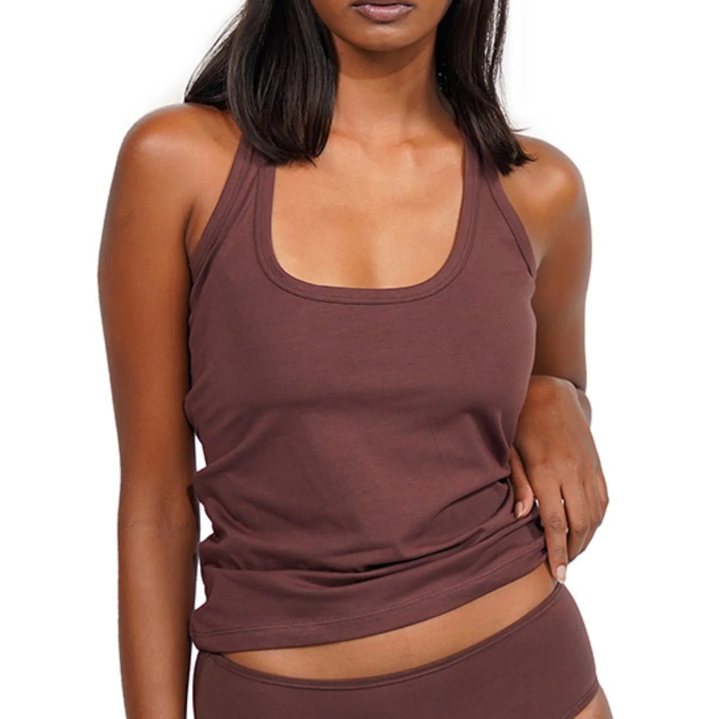 Brown long scoop tank top model wearing comfortable loungewear.